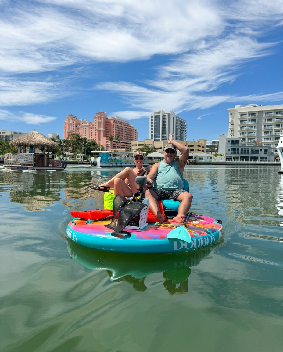 A couple enjoying a cruise aboard a colorful Double GoBoat